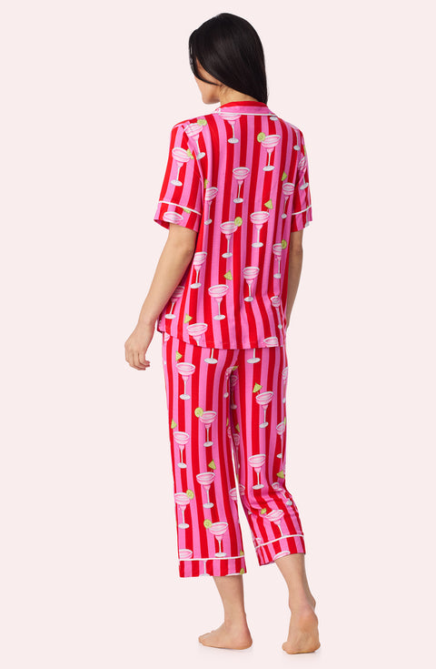 A Lady Wearing Dakota Cropped Knit Pj Set In On The Rocks posing back view