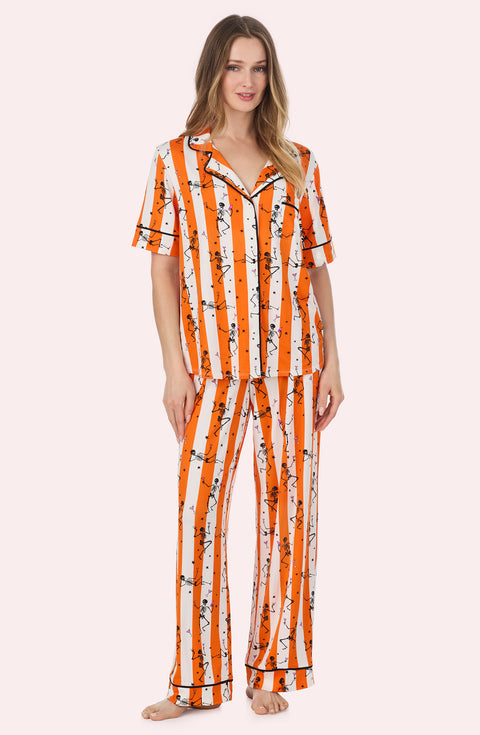 A Lady Wearing Sienna Long Knit Pj Set In Haunted Happy Hour posing in a front facing view