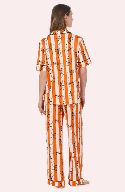 A Lady Wearing Sienna Long Knit Pj Set In Haunted Happy Hour posing in a back view pose