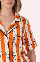 A Lady Wearing Sienna Long Knit Pj Set In Haunted Happy Hour posing in a detail close up shot