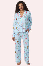 A Lady Wearing Collette Knit Pj Set In Champagne Slopes
