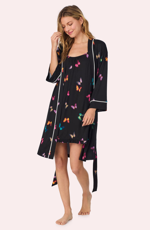 A lady wearing Remi Knit Robe And Chemise Set In Midnight Butterfly