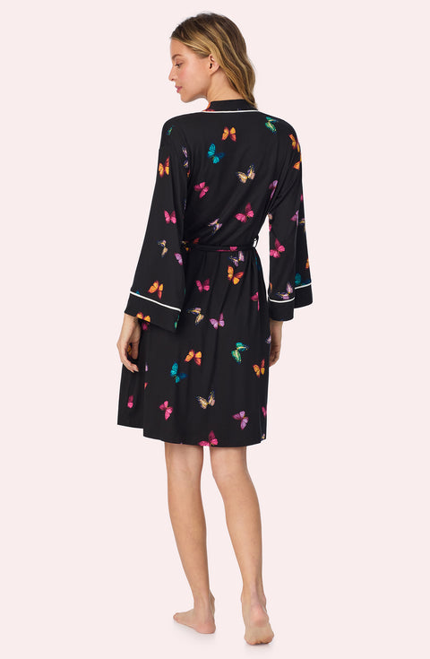 A lady wearing Remi Knit Robe And Chemise Set In Midnight Butterfly