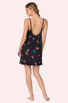 A lady wearing Remi Knit Robe And Chemise Set In Midnight Butterfly
