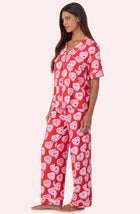 A lady wearing Arizona Long Knit Pj Set In Frosted With Love