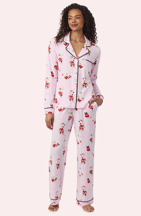 A Lady Wearing Collette Knit Pj Set In Sippin' With Santa