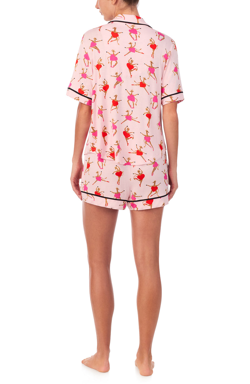 A lady wearing Aspen Pj Set In Giraffes On Pointe