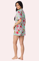 A Lady Wearing Dakota Short Knit Pj Set In Rainforest Escape posing with a back view