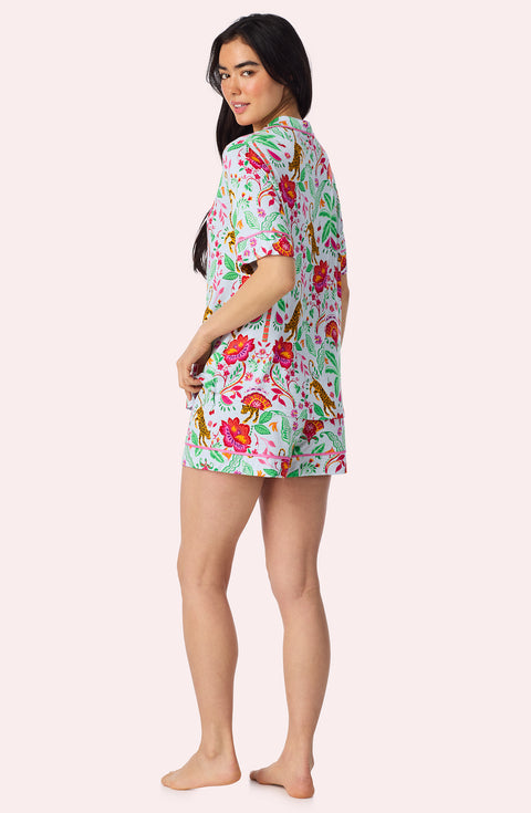 A Lady Wearing Dakota Short Knit Pj Set In Rainforest Escape posing with a back view