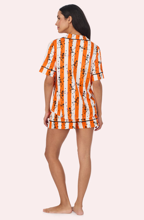 A Lady Wearing Siennna Short Knit Pj Set In Haunted Happy Hour in a back view pose