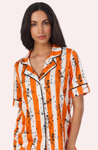 A Lady Wearing Siennna Short Knit Pj Set In Haunted Happy Hour in a front facing close up view pose
