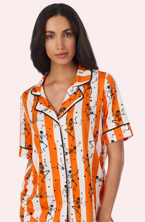 A Lady Wearing Siennna Short Knit Pj Set In Haunted Happy Hour in a front facing close up view pose
