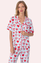 A lady wearing Arizona Long Knit Pj Set In Baby Blue Valentine