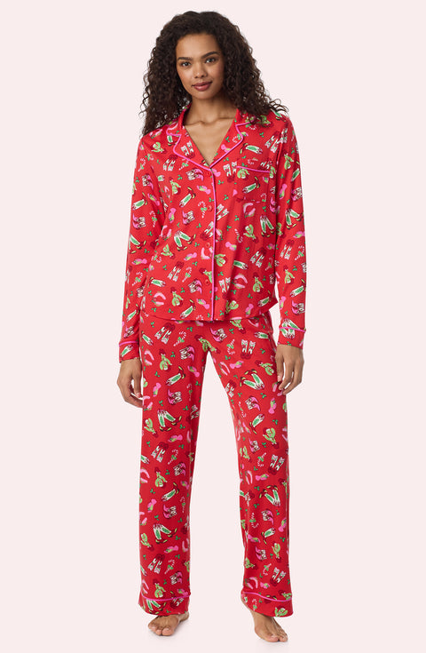 A Lady Wearing Collette Knit Pj Set In Country Claus
