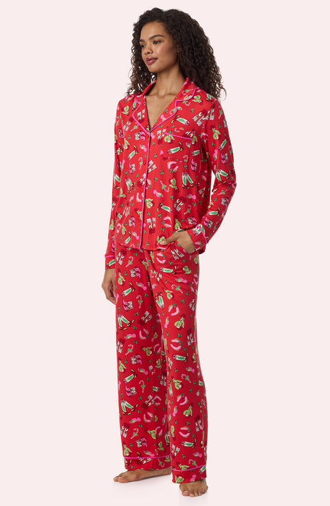 A Lady Wearing Collette Knit Pj Set In Country Claus in a side angle view