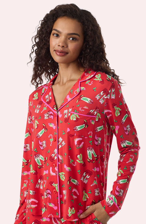 A Lady Wearing Collette Knit Pj Set In Country Claus in a front view closer look