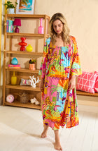 A lady wearing Erica Woven Robe In Sunset Greeting