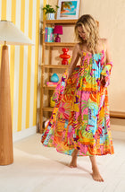 A lady wearing Charlie Woven Chemise In Sunset Greeting