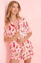 A lady wearing Arizona Short Knit Pj Set In Posh Pups