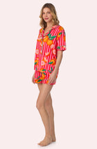 A lady wearing Sienna Short Knit Pj Set In Citrus Stripe Side view