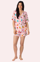 A Lady Wearing Dakota Short Knit Pj Set In Island Party posing front view