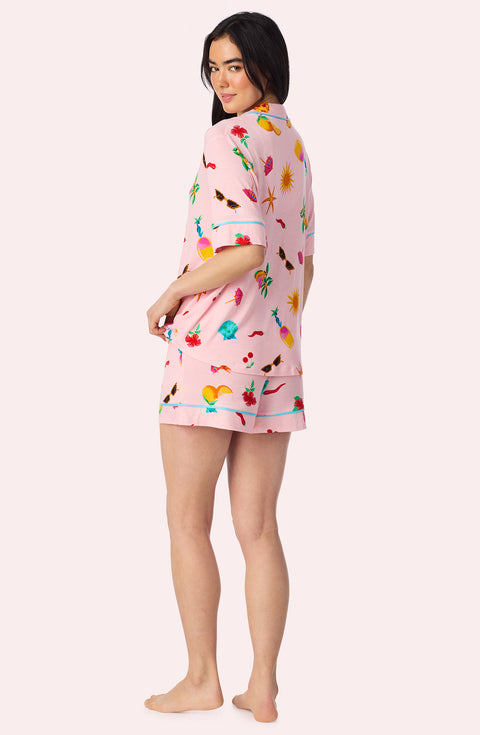 A Lady Wearing Dakota Short Knit Pj Set In Island Party posing back view