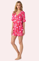 A Lady Wearing Dakota Short Knit Pj Set In On The Rocks posing side angle view