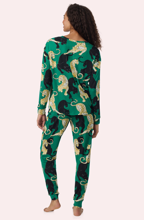A Lady Wearing Stevie Knit Pj Set In Panthera Glam in a back view pose