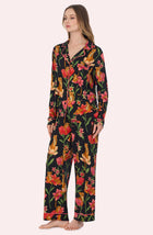 A Lady Wearing Stella Knit Pj Set In Flora & Fierce standing in a side angled view pose