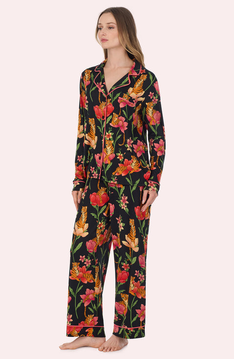 A Lady Wearing Stella Knit Pj Set In Flora & Fierce standing in a side angled view pose