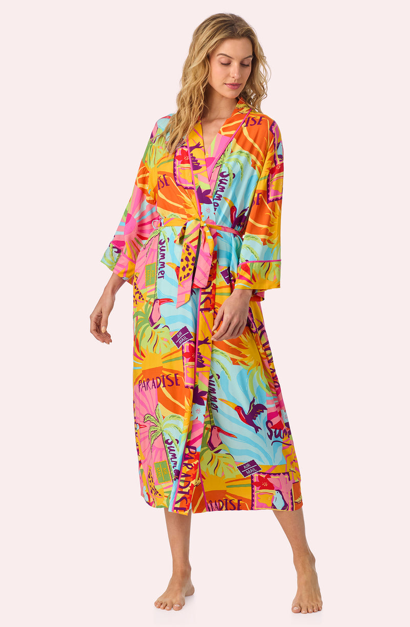 A lady wearing Erica Woven Robe In Sunset Greeting