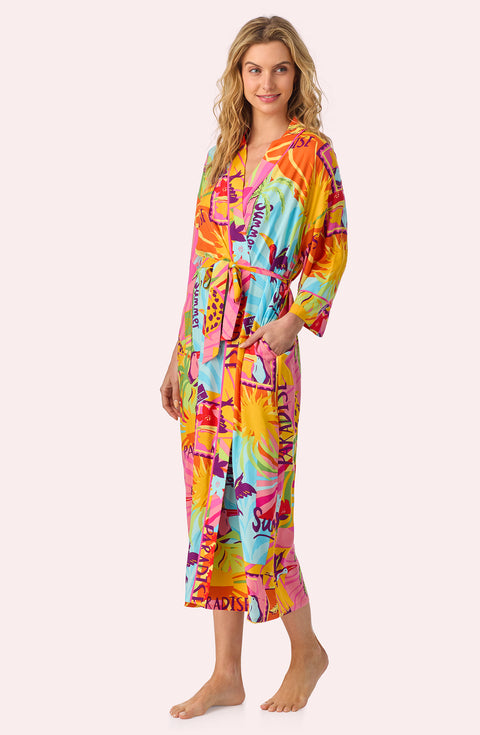 A lady wearing Erica Woven Robe In Sunset Greeting