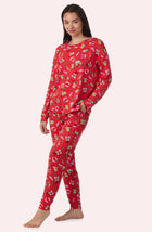 A Lady Wearing Stevie Knit Pj Set In Country Claus in a front view side angle pose