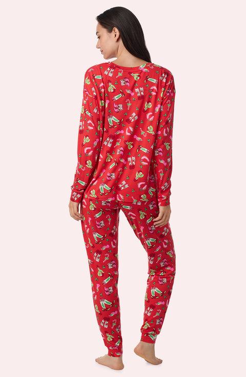 A Lady Wearing Stevie Knit Pj Set In Country Claus in a back view pose