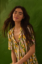 A Lady Wearing Dakota Long Knit Pj Set In Lemonade Stand Stripe facing front with a close up view