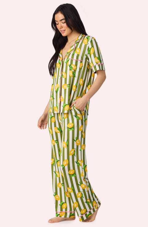 A Lady Wearing Dakota Long Knit Pj Set In Lemonade Stand Stripe in a side angle pose
