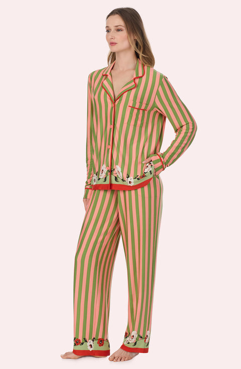 A Lady Wearing Stella Knit Pj Set In Stripes & Stems standing in a side angled view pose