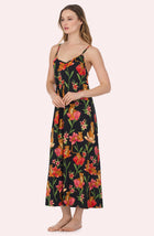 A Lady Wearing Avery Knit Chemise In Flora & Fierce standing in a side angled pose