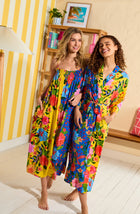 A lady wearing Erica Woven Robe In Paradise Vacay