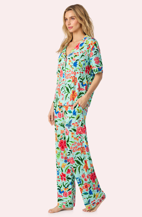 A Lady Wearing Dakota Long Knit Pj Set In Aqua Fleur posing a side angle view