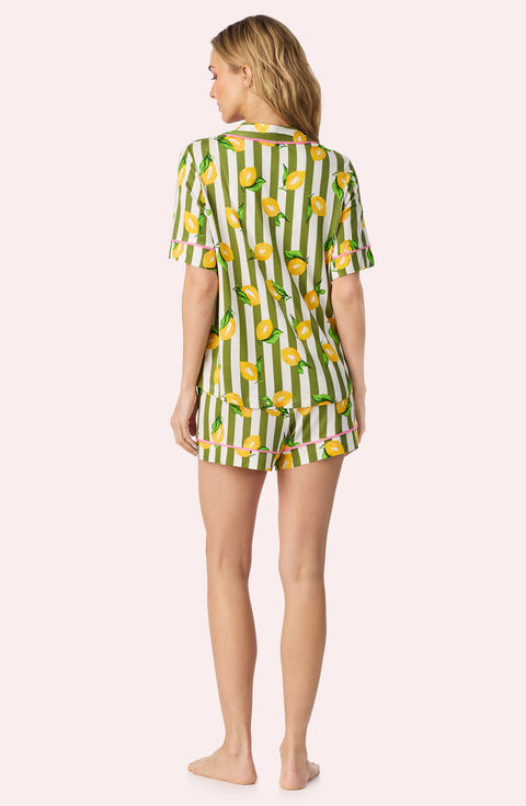 A Lady Wearing Dakota Short Knit Pj Set In Lemonade Stand Stripe posing back view