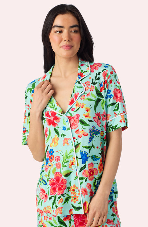A Lady Wearing Dakota Short Knit Pj Set In Aqua Fleur facing front with a close up view