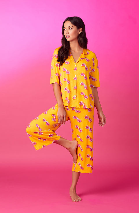 A lady wearing quarter sleeve cropped kiara pj set in sunny honey.