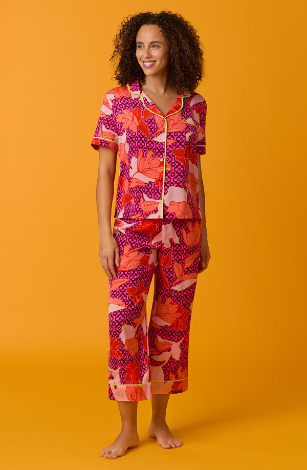 A lady wearing multi color short sleeve chelsa crop pj set with summer orchid.