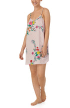 A lady wearing pink sleeveless Lolo Chemise with  Wildflowers print.