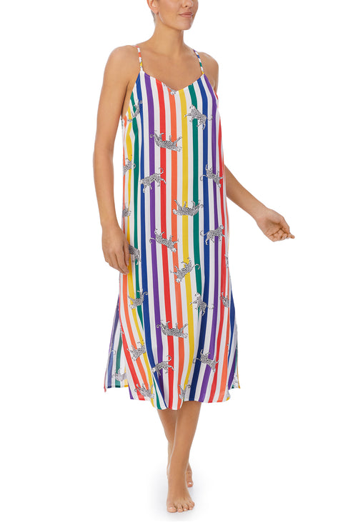 A lady wearing a pride sleeveless long maxi dress with prowling pattern.