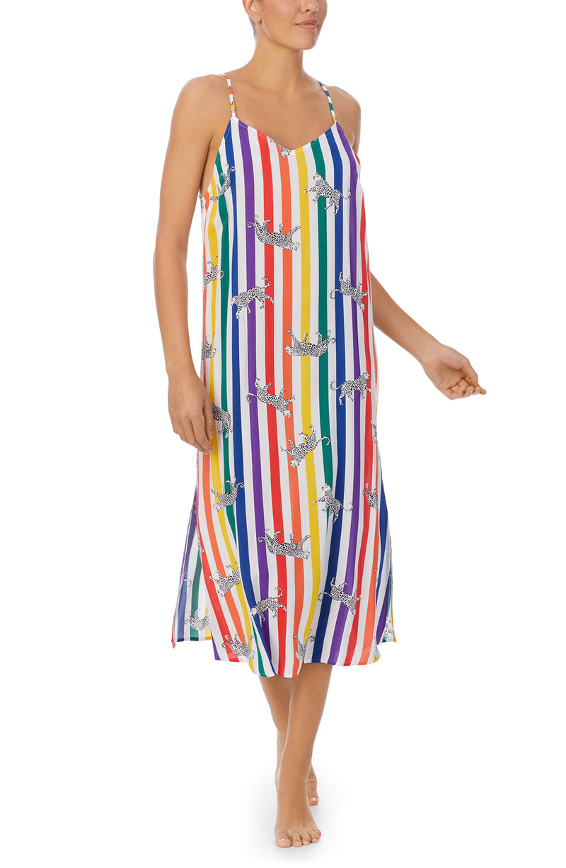 A lady wearing a pride sleeveless long maxi dress with prowling pattern.