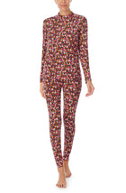 A lady wearing a long sleeve gemma pj set with disty floral pattern.